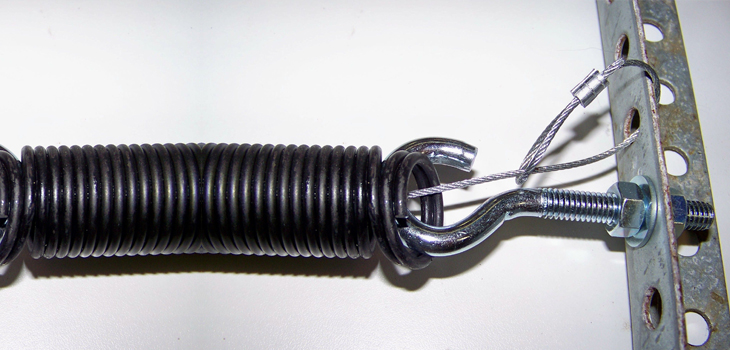 garage door safety spring repair in Valley Glen
